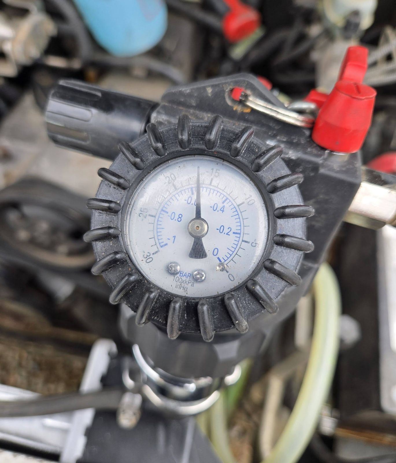 Cooling system pressure tester gauge on the 2003 Ford Ranger