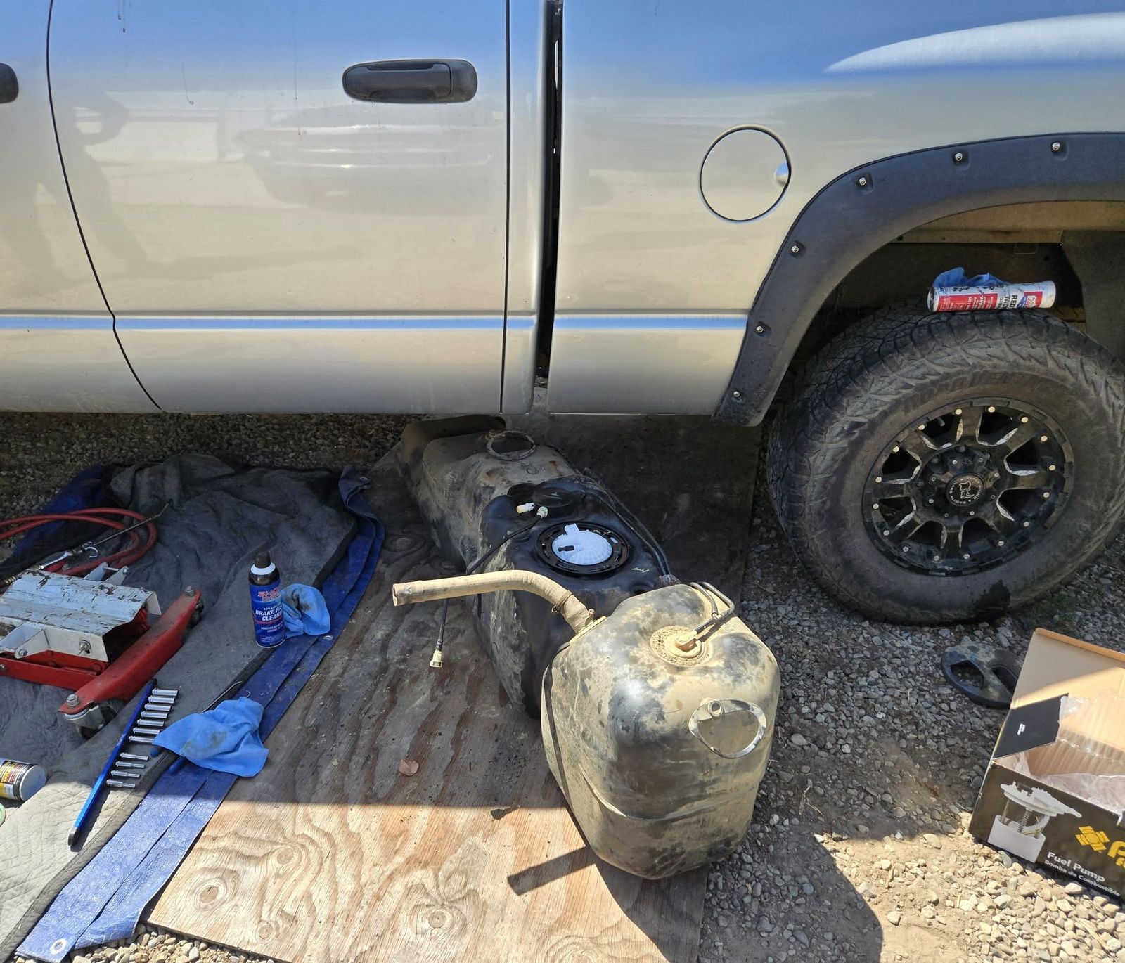 Fuel tank lowered out from under a 2007 Ram 2500 in Ventura for a fuel pump replacement